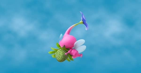 A picture of a Winged Pikmin flying with a green strawberry in its arms.